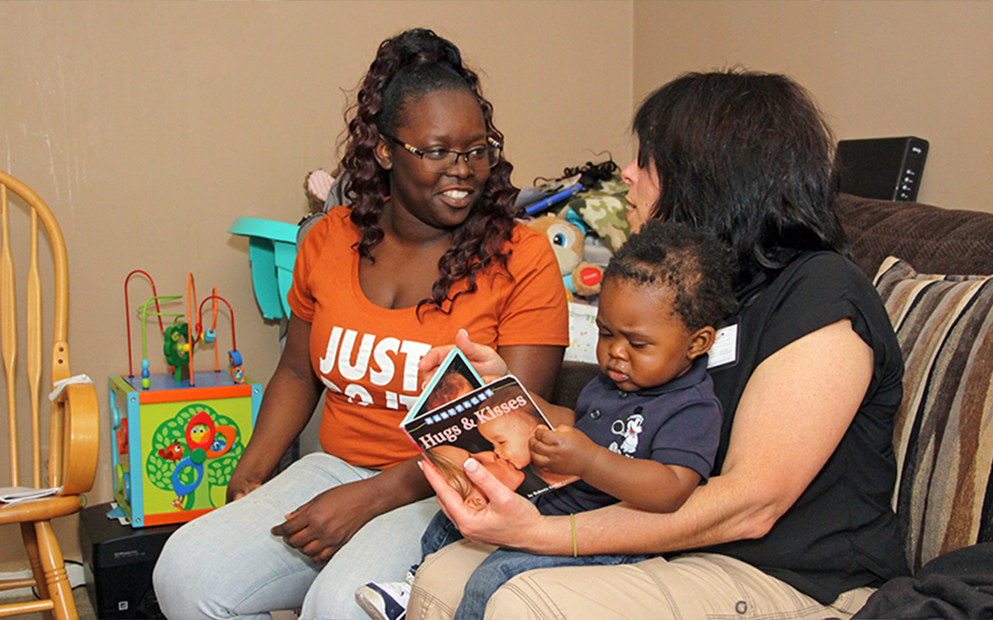a healthcare worker visiting the home of of a new mother