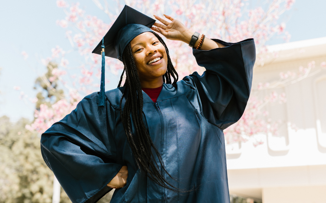 Graduate in a cap and gown