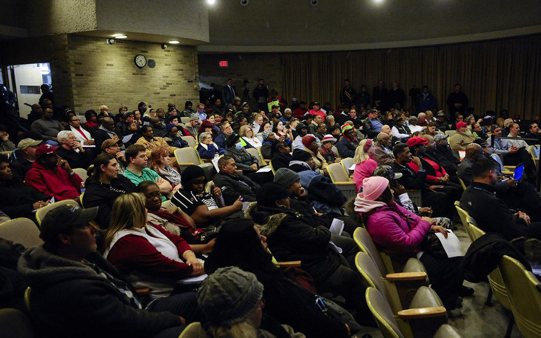 Flint residents voice their concerns at Flint City Hall water meeting. Photo credit: Sam Owens