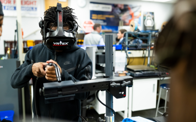 Student at a school in career and technical education using equipment