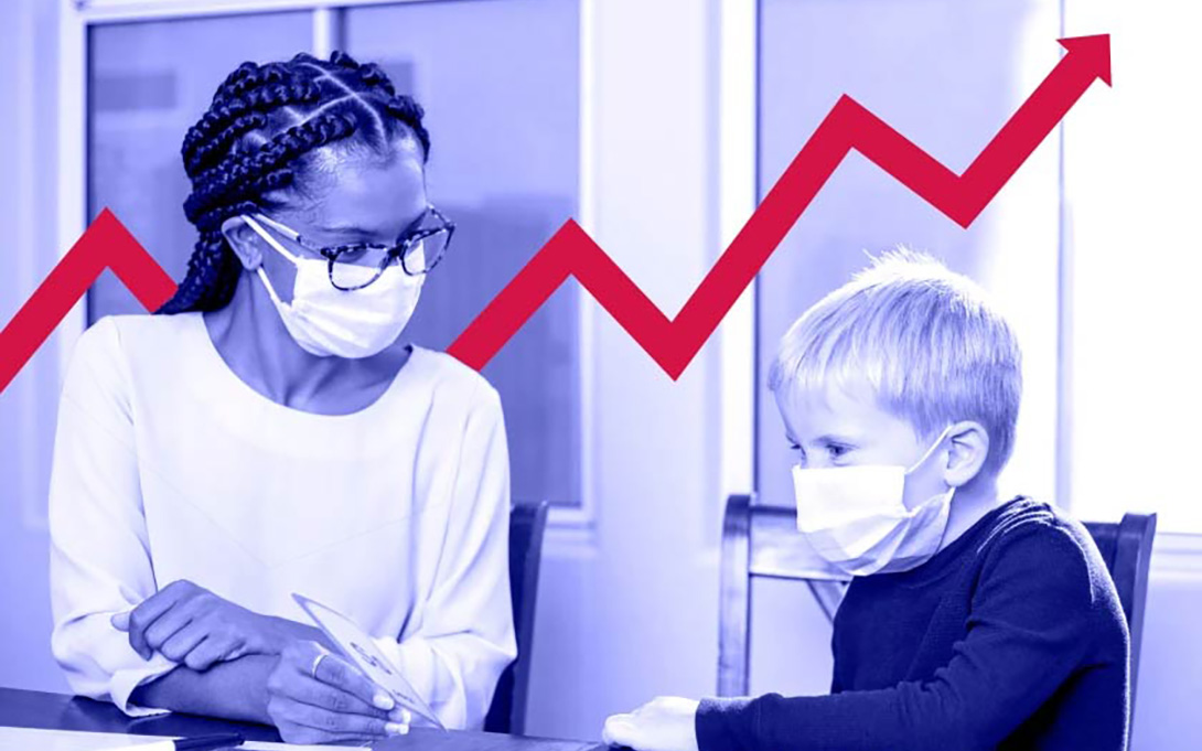 A teacher giving 1:1 math tutoring to an elementary student