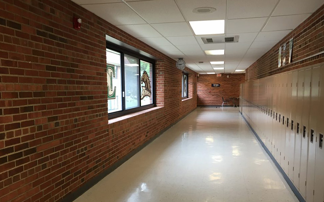An empty school hallway in Detroit. Photo credit: Jake Neher/WDET