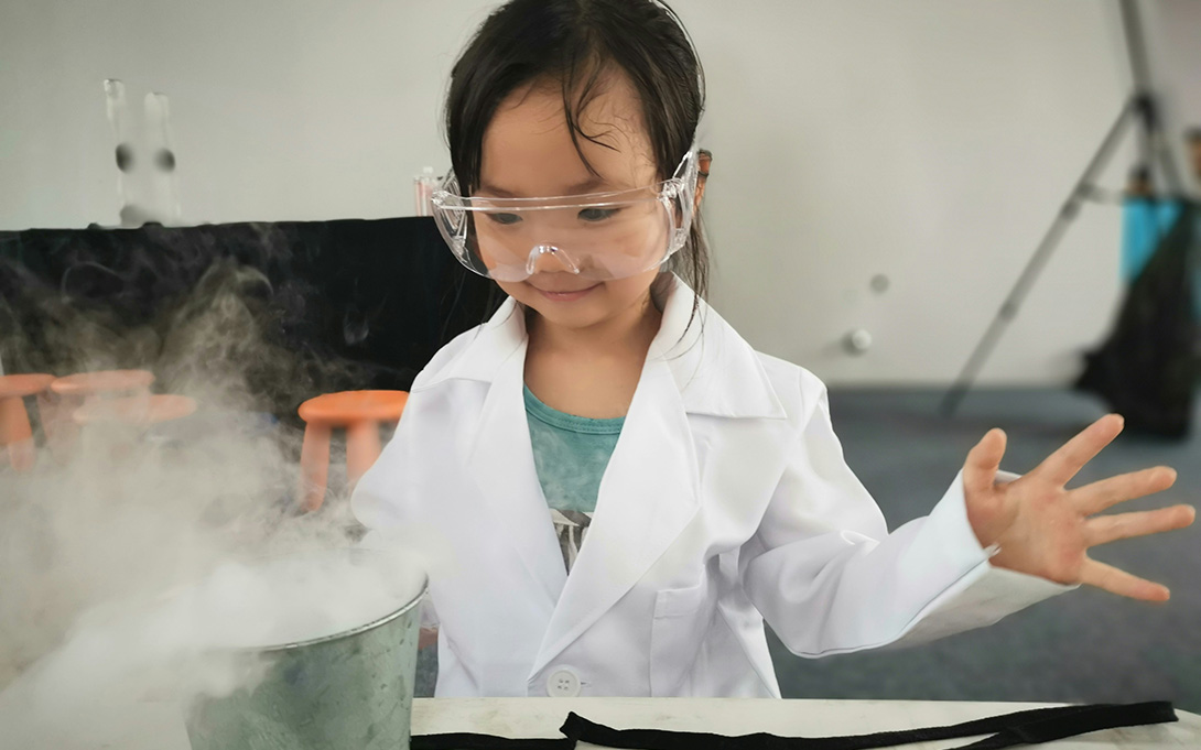 an elementary aged child in science class