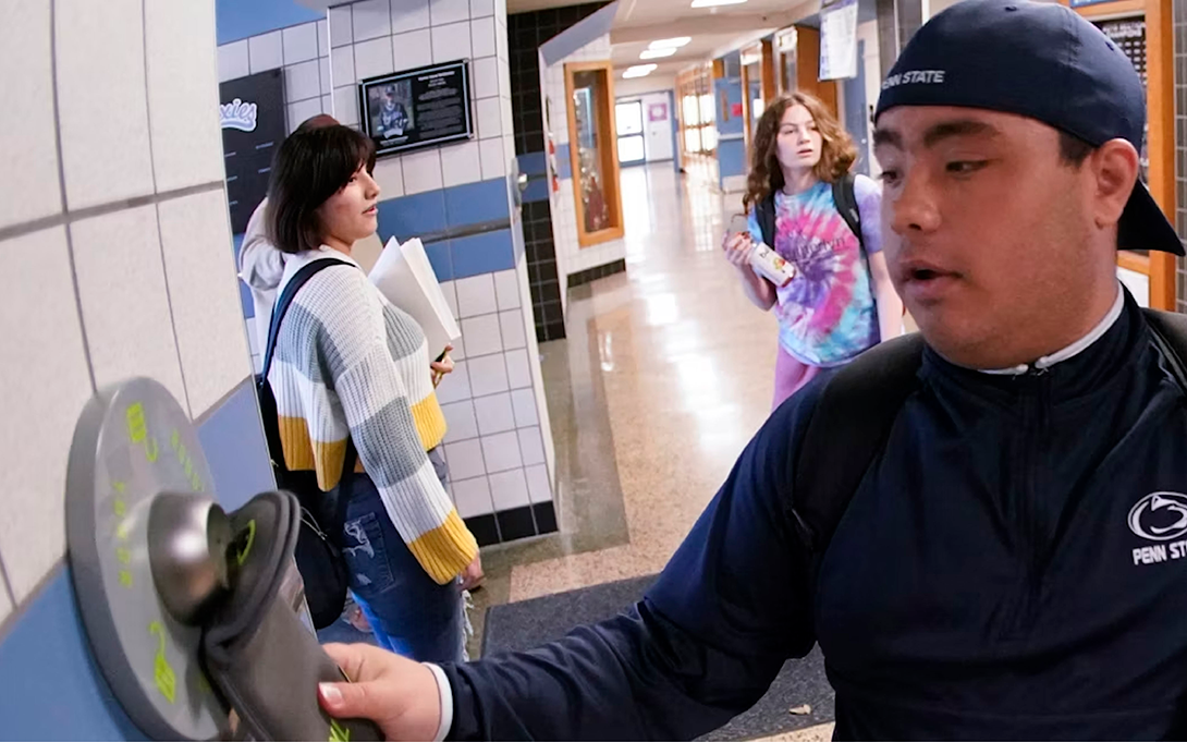 A student uses the unlocking mechanism as he leaves school for the day. Keith Srakocic/AP Photo