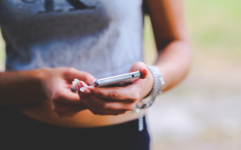 Person holding a cell phone